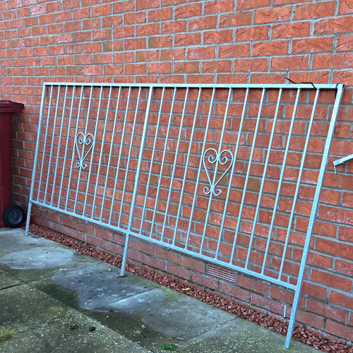 Grey metal fence railing - fence,