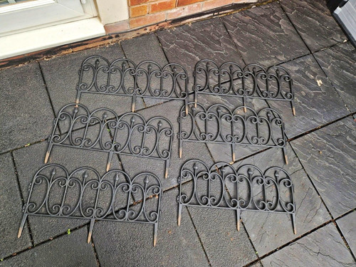 Black metal scroll fence - scroll,